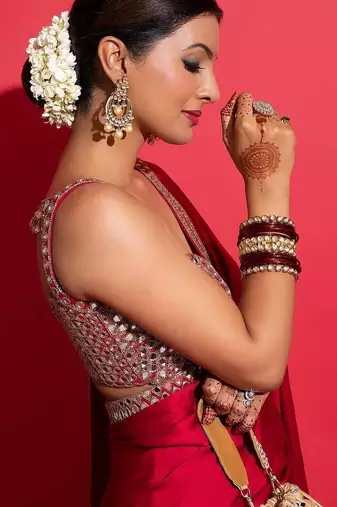 Women red embroidered rangoli silk saree