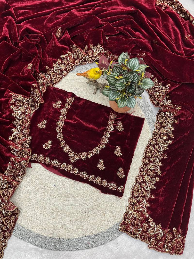 Women maroon embroidered 9000 velvet saree