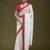 Women white embroidered tissue gold crush saree