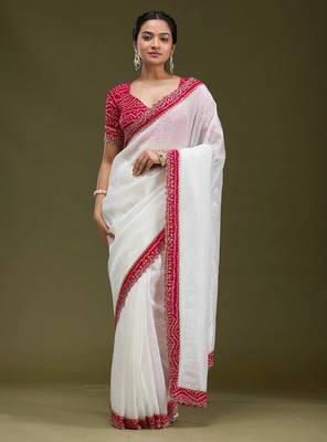 Women white embroidered tissue gold crush saree 3