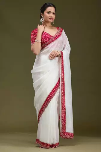 Women white embroidered tissue gold crush saree