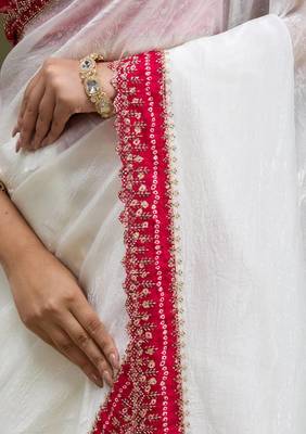 Women white embroidered tissue gold crush saree 5