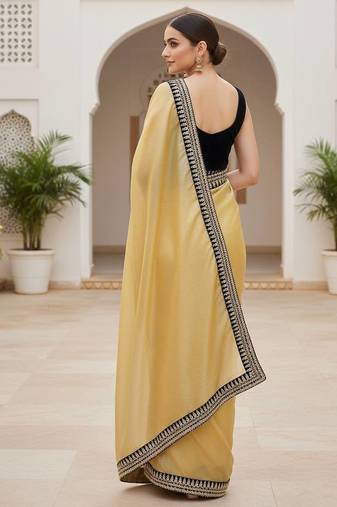 Women yellow embroidered soft twill net saree