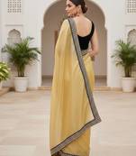 Women yellow embroidered soft twill net saree