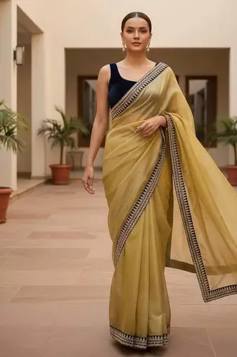 Women yellow embroidered soft twill net saree