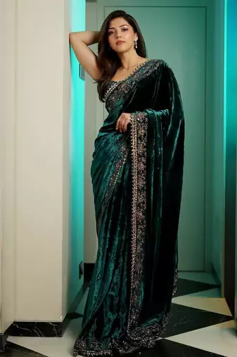 Women green embroidered viscose velvet saree