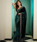 Women green embroidered viscose velvet saree