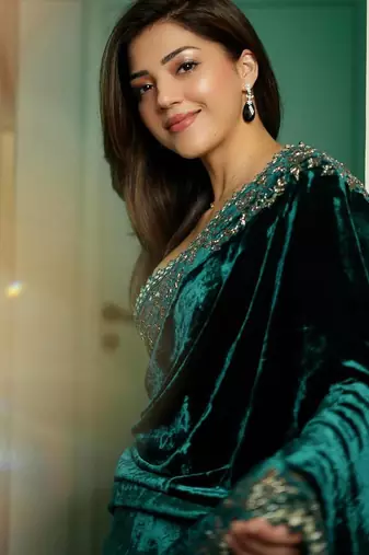 Women green embroidered viscose velvet saree