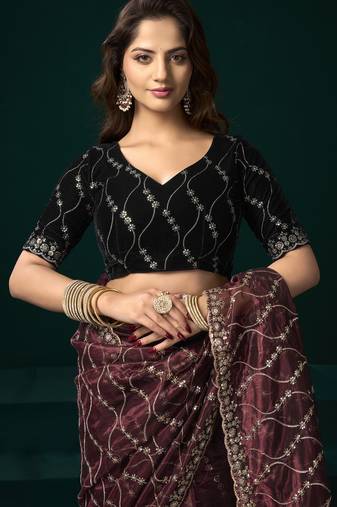 Women maroon embroidered net saree