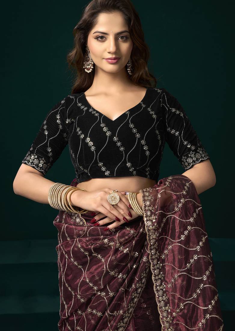 Women maroon embroidered net saree