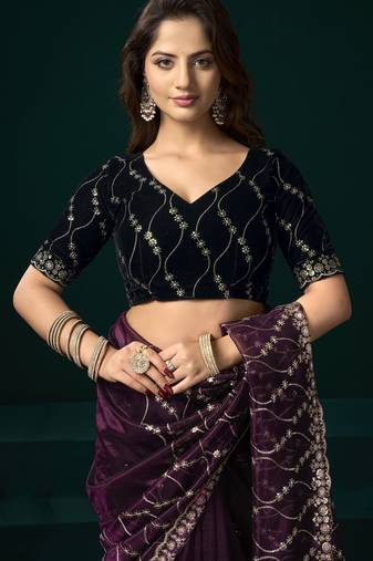 Women wine embroidered net saree