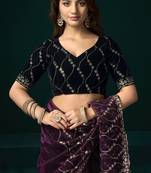 Women wine embroidered net saree