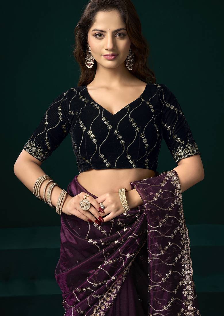 Women wine embroidered net saree