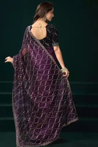 Women wine embroidered net saree