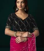 Women rani pink embroidered net saree
