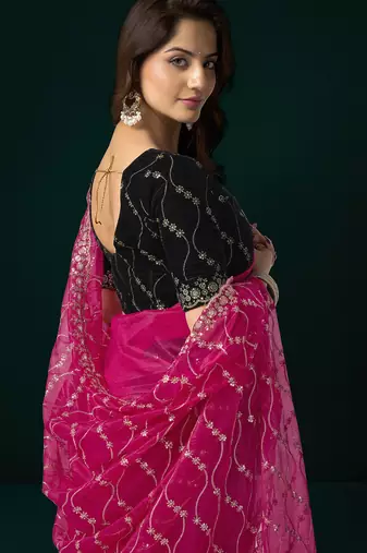 Women rani pink embroidered net saree