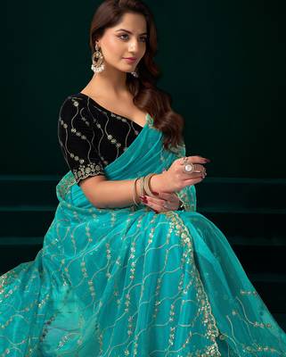 Women turquoise embroidered net saree 1