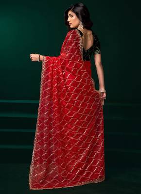 Women red embroidered net saree 3