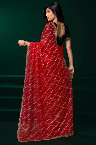 Women red embroidered net saree