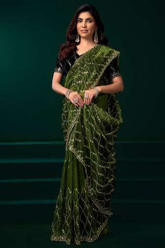 Women green embroidered net saree