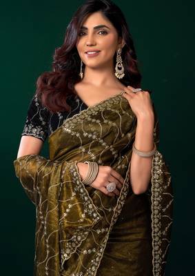 Women mehandi green embroidered net saree 2