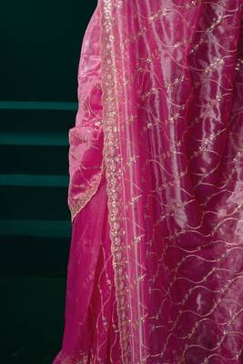 Women pink embroidered net saree 3