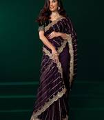 Women wine embroidered net saree