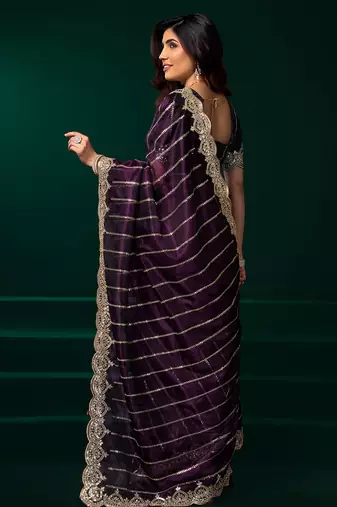 Women wine embroidered net saree