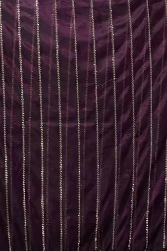 Women wine embroidered net saree