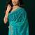 Women turquoise blue embroidered net saree