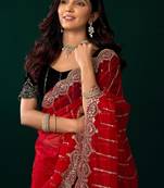 Women red embroidered net saree