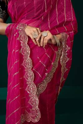 Women rani pink embroidered net saree 1