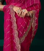 Women rani pink embroidered net saree
