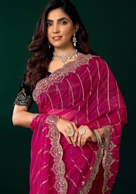 Women rani pink embroidered net saree 2