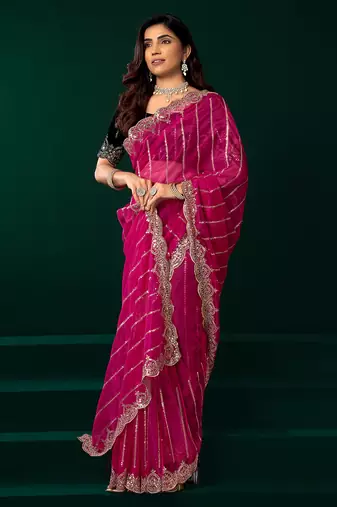 Women rani pink embroidered net saree