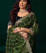 Women green embroidered net saree