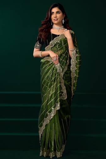 Women green embroidered net saree