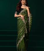 Women green embroidered net saree
