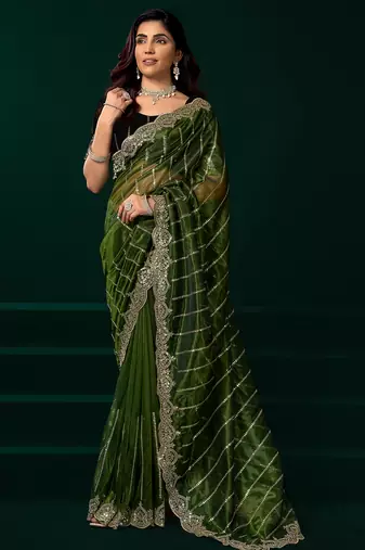 Women green embroidered net saree