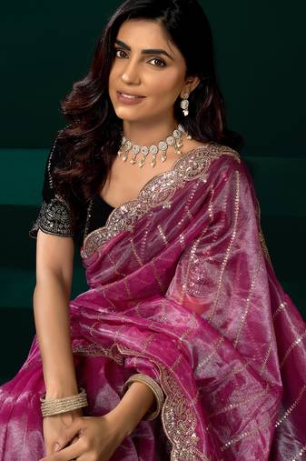 Women pink embroidered net saree