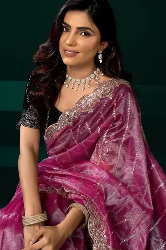 Women pink embroidered net saree