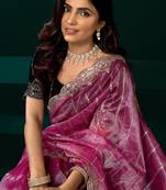 Women pink embroidered net saree