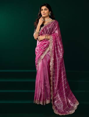Women pink embroidered net saree 3