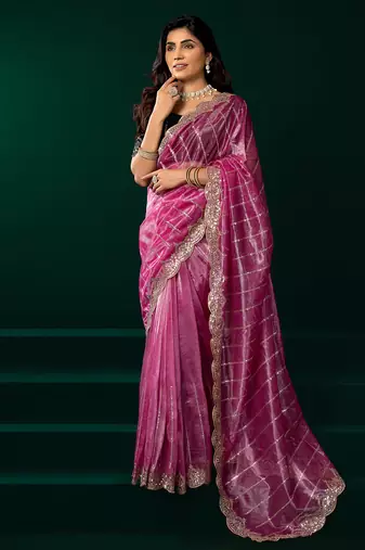 Women pink embroidered net saree