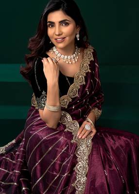 Women purple embroidered net saree 2