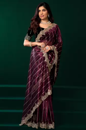 Women purple embroidered net saree