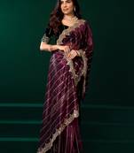 Women purple embroidered net saree