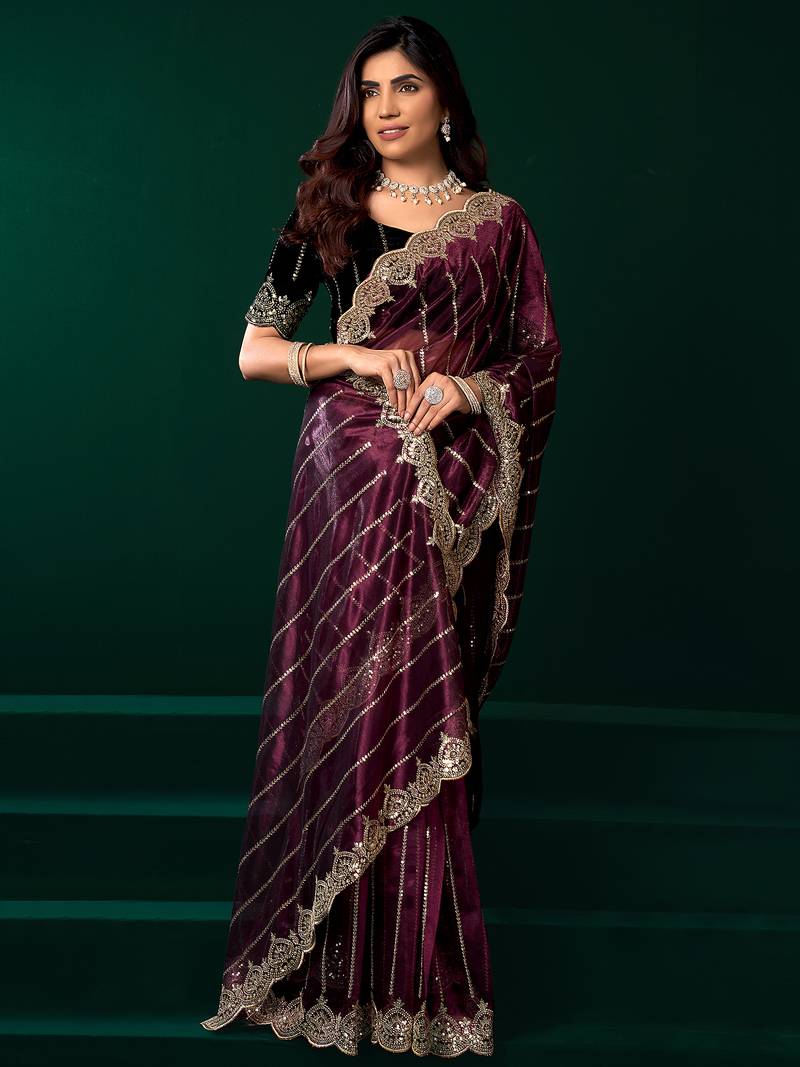 Women purple embroidered net saree