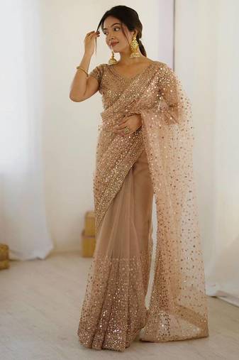 Beige net embroidered saree