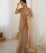 Beige net embroidered saree